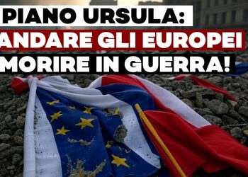 Bandiera dell'Ue e della Francia fra le macerie di un bombardamento