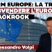 Il parlamento europeo davanti al quale sventola la bandiera europea e in primo piano Alessandro Volpi