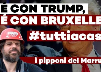 Marrucci con elmetto da cantiere con Donald Trump sullo sfondo