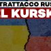 Muro con crepa centrale che divide le bandiere dipinte di Russia e Ucraina