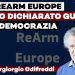 Piergiorgio Odifreddi. Sullo sfondo il logo di ReArm Europe