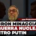 Putin e Macron si guardano con Francesco dall'Aglio in primo piano