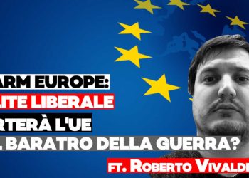 Roberto Vivaldelli con la bandiera Ue sullo sfondo