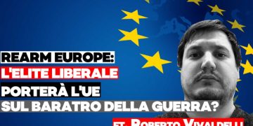 Roberto Vivaldelli con la bandiera Ue sullo sfondo