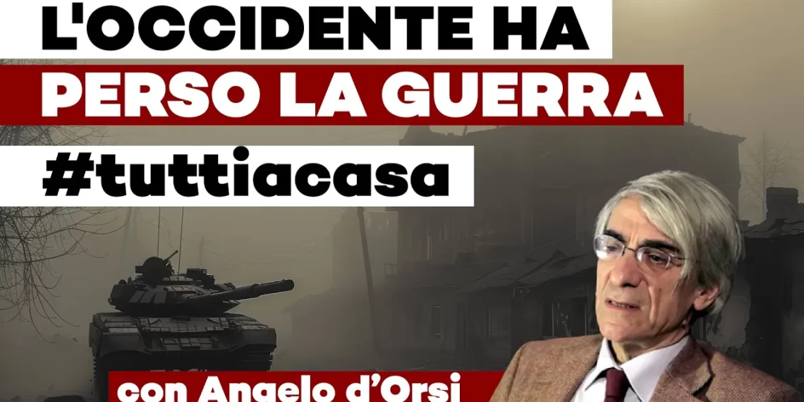 Scenario di guerra con carro armato e Angelo d'Orsi in primo piano