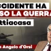 Scenario di guerra con carro armato e Angelo d'Orsi in primo piano
