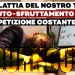 Uomo addormentato sulla scrivania davanti al pc