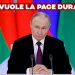 Vladimir Putin alla scrivania con bandiere sullo sfondo