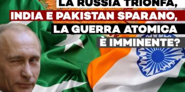 Vladimir Putin fa l'occhiolino davanti a una bandiera indiana