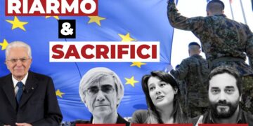 Sergio Mattarella con la bandiera Ue e un soldato che la regge