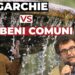 Una fontana. Beppe Grillo e Ugo Mattei in primo piano
