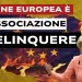 Bandiera europea in fiamme. Ursula von der Leyen in primo piano