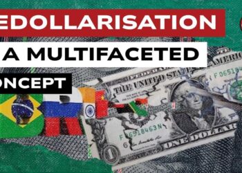 Banconota da un dollaro stracciata con il simbolo dei BRICS