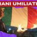 Bandiera italiana in fiamme. Donald Trump guarda Ursula von der Leyen