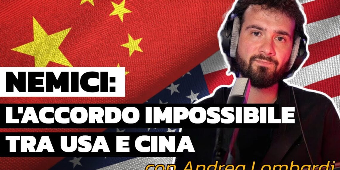 Bandiere di Cina e Stati Uniti. Andrea Lombardi in primo piano