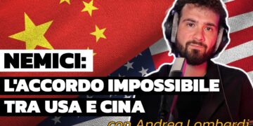 Bandiere di Cina e Stati Uniti. Andrea Lombardi in primo piano