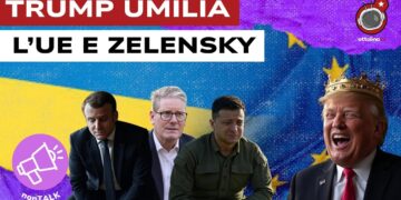 Bandiere ucraina e europea. Emmanuel Macron, Friedrich Merz e Volodymyr Zelensky affrati e Donald Trump con la corona e ridente in primo piano