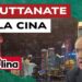 Panorama di una città cinese di notte. Pino Arlacchi in primo piano