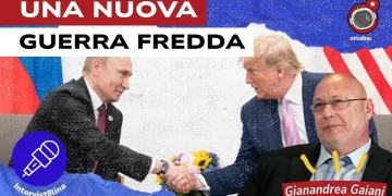 Vladimir Putin e Donald Trump si stringono la mano. Gianandrea Gaiani in primo piano