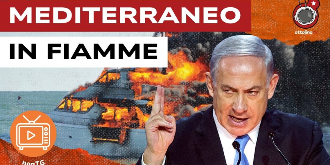Imbarcazione in fiamme. Banjamin Netanhyau in primo piano