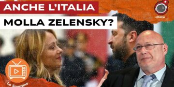 Giorgia Meloni e Volodymyr Zelensky si guardano con dolcezza. Gianandrea Gaiani in primo piano
