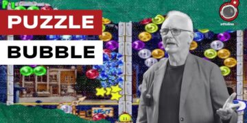 Schermata del gioco Puzzle Bubble. Michael Roberts in primo piano