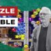 Schermata del gioco Puzzle Bubble. Michael Roberts in primo piano