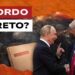 Cartelletta con la scritta confidential. Vladimir Putin e Donald Trump si stringono la mano in primo piano