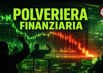 Operatori a braccia alzate davanti a un tabellone con gli indici di borsa