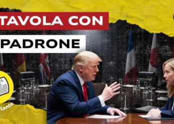 Sala della Conferenza di Monaco. Donald Trump e Giorgia Meloni parlano seduti al tavolo in primo piano