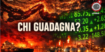 Città portuale con fiamme ed esplosioni a sinistra. Indici di borsa a destra