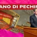 Sala congressi cinese dove si svolgono le Due Sessioni. Un funzionario cinese in primo piano