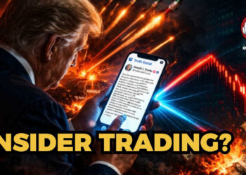 Sullo sfondo, esplosioni e indici di Borsa. Donald Trump scrive su Truth Social da uno smartphone in primo piano