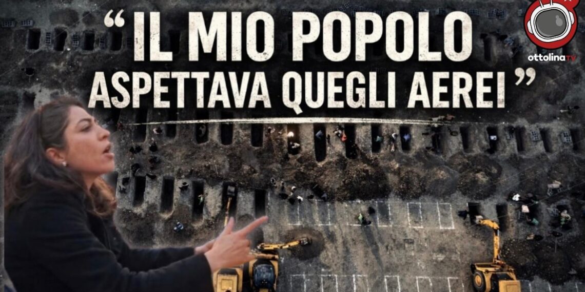 Visione dall'alto di uno scavo di tombe. Minoo Mirshahvalad in primo piano