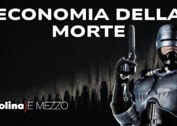 Cyborg con un'arma in pugno su sfondo nero