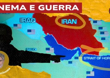Sagoma di uomo che indica lo Stretto di Hormuz su una mappa
