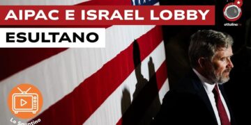 Thomas Massie con la bandiera USA alle spalle