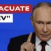 Vladimir Putin accigliato e con l'indice alzato