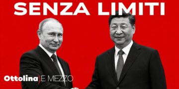 Vladimir Putin stringe la mano a Xi Jinping