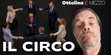 I leader europei fanno il girotondo attorno a Donald Trump seduto bendato. Giuliano Marrucci in primo piano