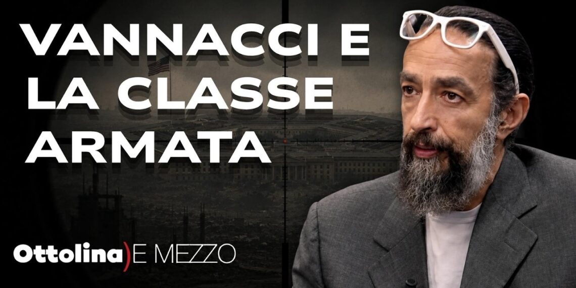 Scenario di città bombardata. David Colantoni in primo piano