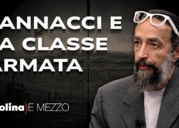 Scenario di città bombardata. David Colantoni in primo piano