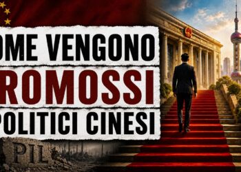 Un uomo cinese elegante di spalle sale una scala di velluto rosso verso la sede del Partito Comunista