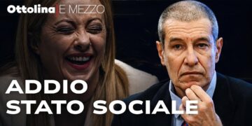 Giorgia Meloni che ride e Alessandro Volpi