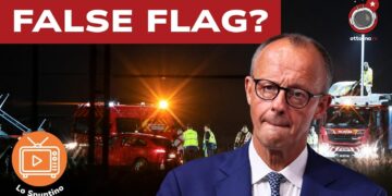 Luogo di un incidente serale con mezzi di soccorso. Friedrich Merz in primo piano