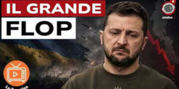 Scenario di guerra. Volodymyr Zelensky deluso in primo piano
