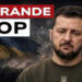 Scenario di guerra. Volodymyr Zelensky deluso in primo piano
