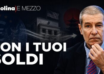 Simboli di Euro e Yen con la Fed nel mezzo. Alessandro Volpi in primo piano