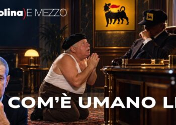 Fantozzi in ginocchio davanti a un uomo di ENI. Alessandro Volpi in primo piano