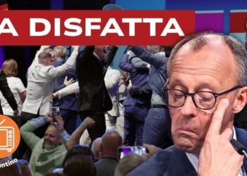 Persone esultano dopo l'esito delle elezioni in Sassonia. Friedrich Merz in primo piano